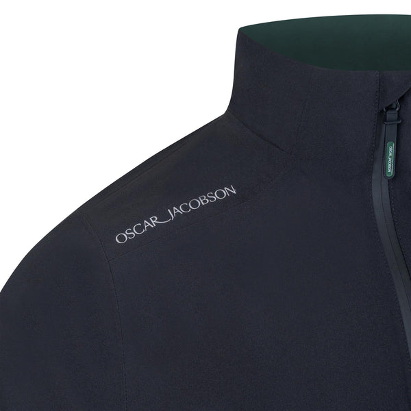 Navy jacket with 'Oscar Jacobson' branding on a white background