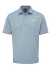 Light blue polo shirt with 'Oscar Jacobson' branding on a white background